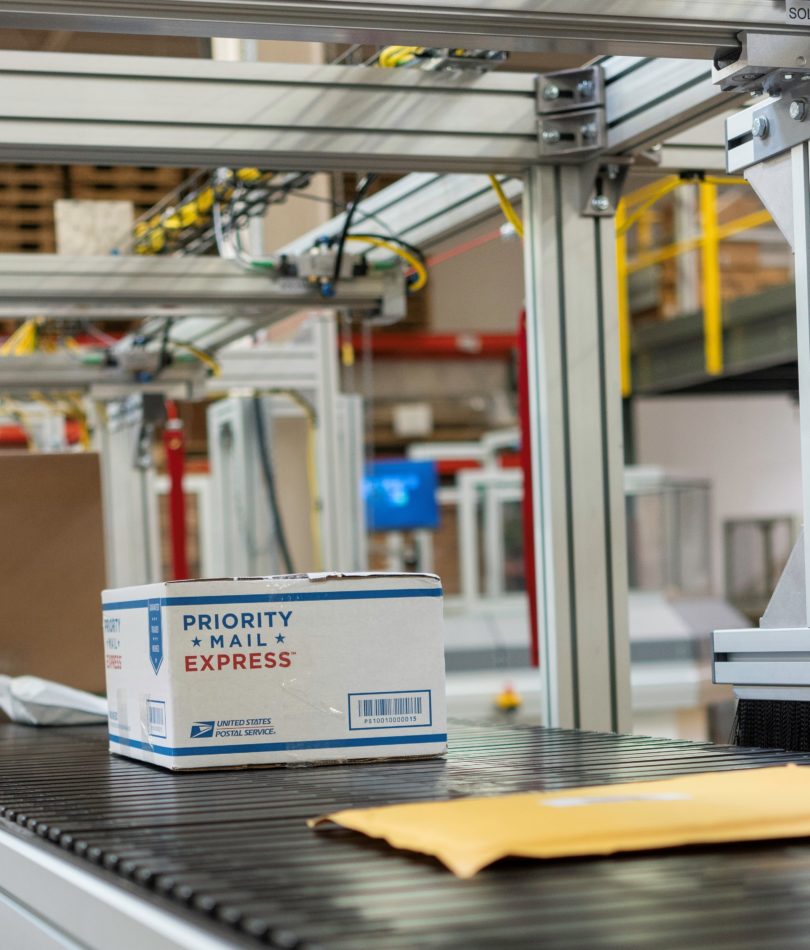 Push Bar Sorter in use at a USPS Mail facility.