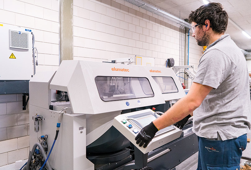 image of the aluminium sawing machine inside the EuroSort production facility being operated by an operator